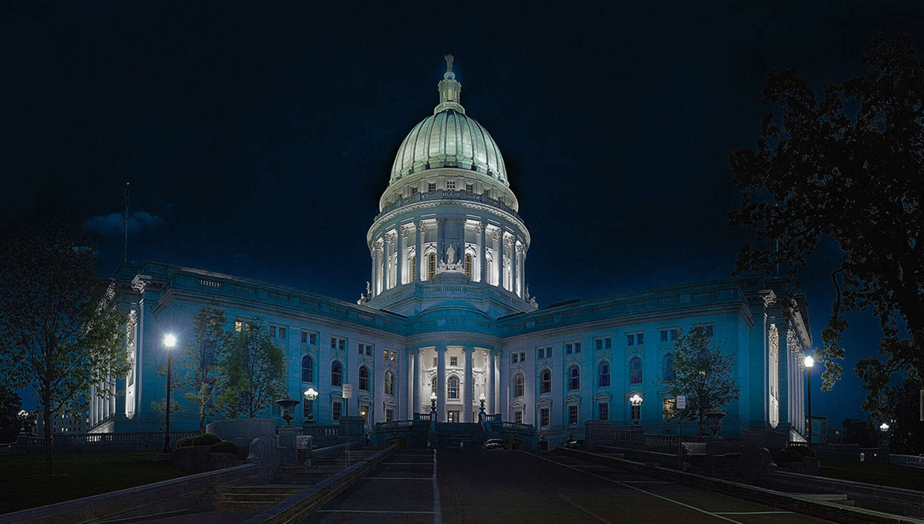 A large building with lights on it's sides.